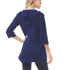 Detailed side view of navy blue hooded top with three-quarter sleeves and soft fabric