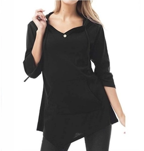 Detail of V-neck hoodie with button accent, kangaroo pocket, and asymmetric hemline