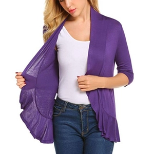 Purple open front knit cardigan with ruffle trim and 3/4 sleeves on model