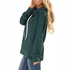Detail view of forest green hoodie with contrasting white drawstring and ribbed hem