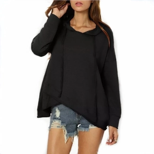 Detail of oversized black hoodie with asymmetric hem and casual drawstring hood style