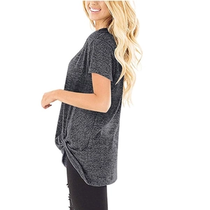 Side view of dark gray heather t-shirt featuring a stylish front knot detail and crew neck