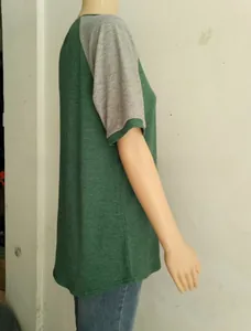 Detailed close-up showing the crew neck and contrast raglan sleeves of a sporty casual t-shirt