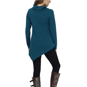 Detail view of the back of teal long sleeve top with an asymmetrical hemline design