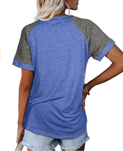 Detail view of the back of a blue and grey raglan sleeve t-shirt for women in summer