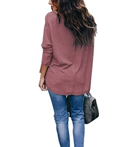 Back view of a loose waffle knit V-neck long sleeve shirt in dusty rose color