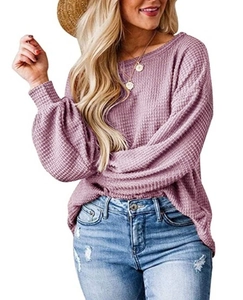 Detail of waffle-knit texture on long-sleeve mauve lantern sleeve top for women