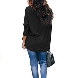 Detailed back view of a black waffle knit long sleeve top with loose fit for casual wear