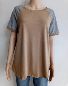 Detail of color block short sleeve t-shirt with brown body and light grey raglan sleeves