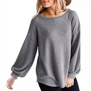 Women's casual grey waffle knit top with lantern sleeves and a round neck design