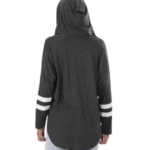 Detail of dark grey hoodie with white sleeve stripes and asymmetrical curved hemline