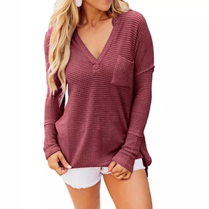 Women's burgundy V-neck waffle knit long sleeve top with chest pocket and loose casual fit