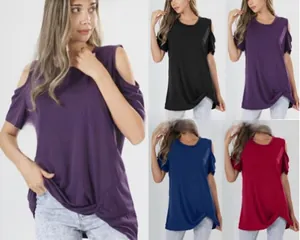 Close-up of women's cold shoulder short sleeve tops with asymmetrical twist knot hem detail