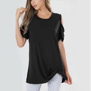 Close-up of black cold shoulder t-shirt featuring a stylish side knot detail on the hem