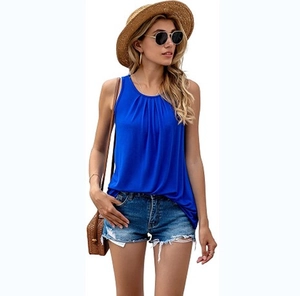 Close-up of royal blue sleeveless top with pleated front details and round neckline