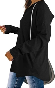 Detail view of black V-neck hoodie with white drawstrings and side slits high-low hem