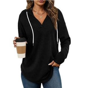 Detail of black V-neck hoodie with white drawstrings and casual long sleeves for women