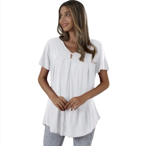 Detail of white V-neck short sleeve top showing pleated chest design and loose draping fabric