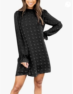 Detailed view of black Swiss dot texture on the sleeve with elastic ruffled cuffs