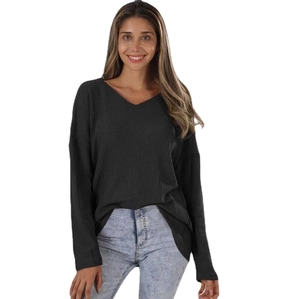 Women's V-neck waffle knit long sleeve top in black with a loose fit and dropped shoulders