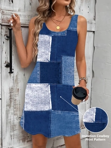 Detailed close-up of sleeveless dress featuring blue imitation cowboy denim print pattern