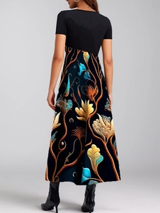 Detailed view of bohemian floral print and contrast stitching on elegant long dress