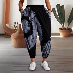 Relaxed fit black and white tie-dye joggers with tapered cuffs for a casual look
