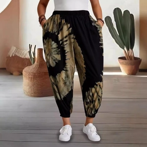 Women's black and beige floral tie-dye harem pants with elastic waist and cuffed hem