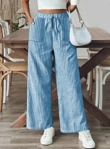 Detailed view of elastic drawstring waist and vertical stripes on casual wide leg pants