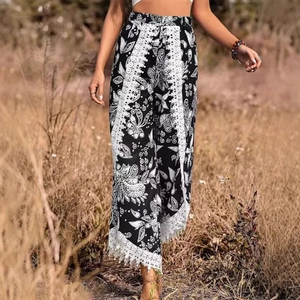Pantalon bohème large à imprimé floral avec bordure en dentelle blanche et papillons