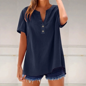 Detailed view of the linen fabric texture and V-neck button design on the navy blue blouse