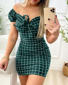 Detail of green plaid off-shoulder mini dress with front bow knot and slim bodycon fit