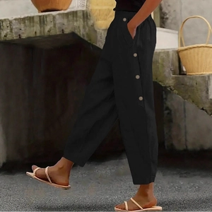 Women's vintage loose black cotton linen trousers with elastic waist and side button detail