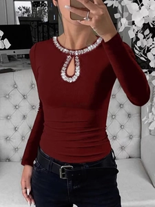 Slim fit burgundy ribbed long sleeve top with rhinestone cutout neckline for women