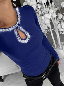 Slim fit navy blue long sleeve top with ribbed texture and rhinestones on neckline