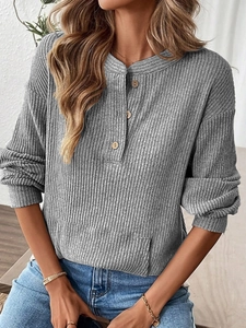 Women's grey long sleeve knit Henley shirt with buttons and front kangaroo pocket
