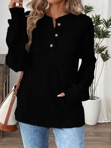 Women's black long sleeve ribbed knit Henley shirt with wood buttons and kangaroo pocket