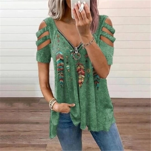 Detail of V-neck zipper top with striped cold shoulder cutouts and feather print design