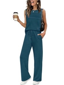 Detail of teal pleated sleeveless top and drawstring wide-leg pants women's leisure set