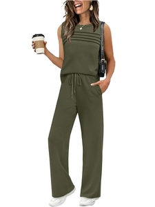 Detail view of the olive green pleated sleeveless top and drawstring wide-leg pants set