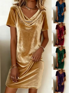 Detail view of cowl neck design and soft velvet texture on a slim-fit short sleeve dress