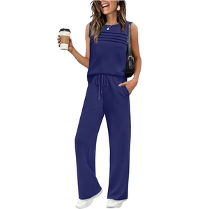 Navy blue two-piece lounge set with sleeveless pleated top and high waist drawstring pants