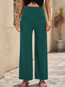 Pantalón ancho de mujer verde oscuro en punto de canalé con cintura alta elástica