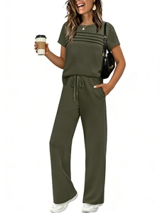 Women's olive green two-piece set featuring pleated short sleeve top and wide leg trousers