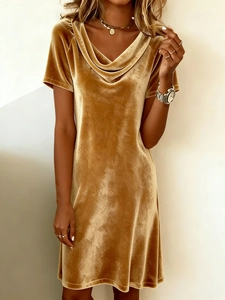 Detailed view of the ginger velvet dress featuring a soft cowl neck and premium fabric texture