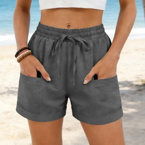Detail view of high waist drawstring shorts in dark grey with side pockets