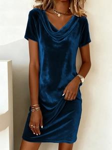Close-up of the cowl neck design and velvet texture on this royal blue dress