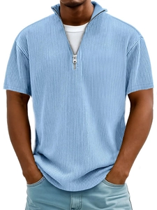 Detail of light blue ribbed fabric and silver zipper neckline on men's short sleeve polo shirt