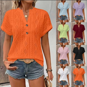 Detail of V-neck knit T-shirt featuring decorative buttons and diamond hollow texture
