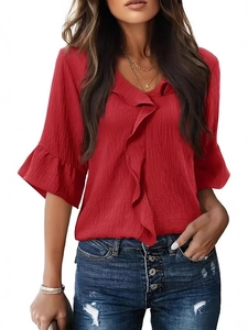 Red V-neck blouse with ruffle trim and flare sleeves on white background